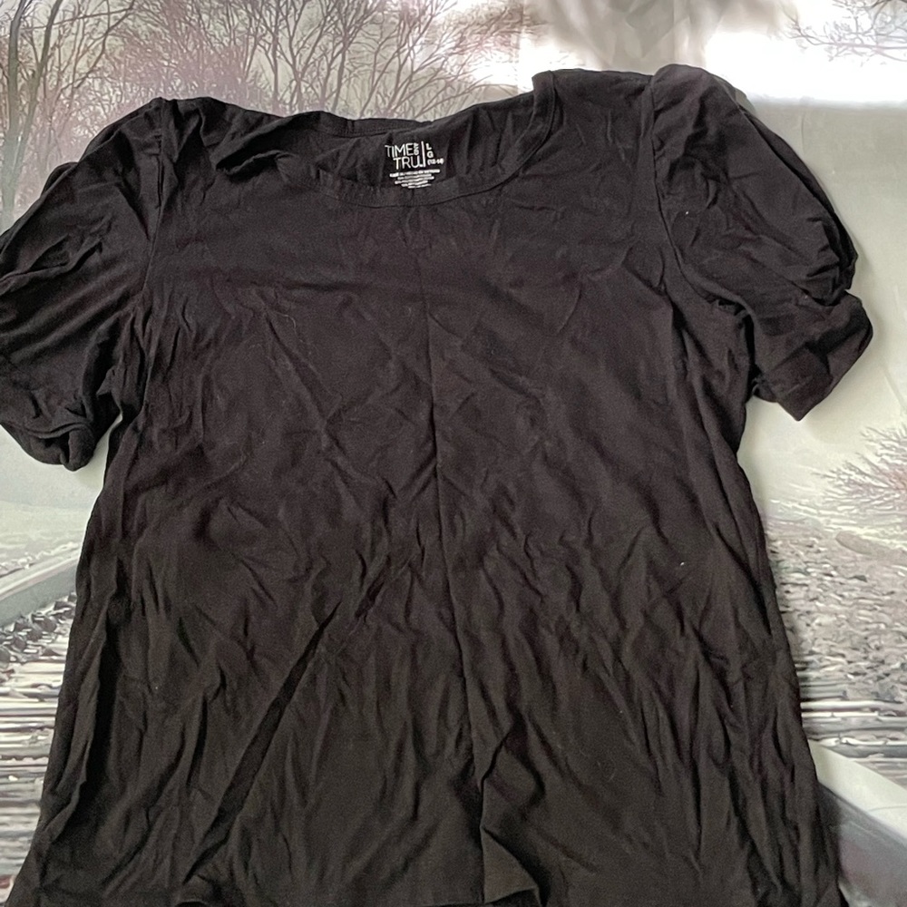 Black top with puff sleeves